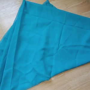 Blue sheer curtain panel